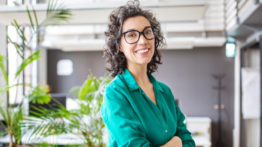 Business woman with glasses smiling